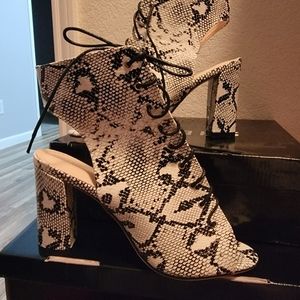 Brand new never worn snake skin peep toe heels form Shein